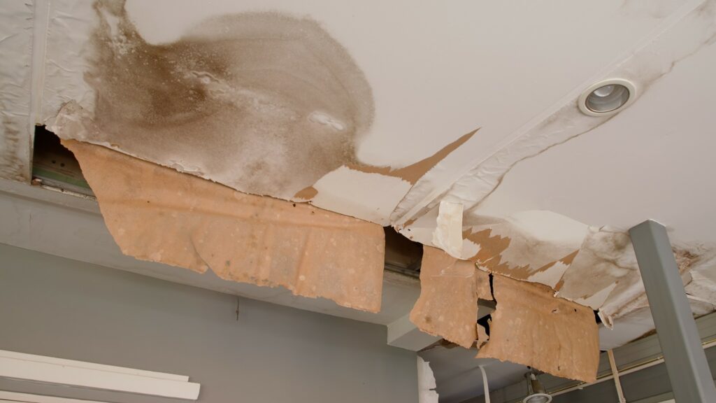 Interior ceiling water damage before restoration